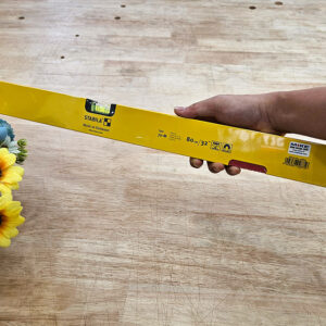 Spirit level STABILA type 70M employs dual vials, horizontal and vertical, with ±0.029° accuracy for reliable alignment and plumbing tasks.