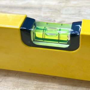 Stabila Type 70P-2-2 spirit level features four vials, enabling multidirectional readings for consistent accuracy in masonry alignment tasks.