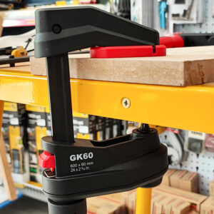 Quick-release red button allows BESSEY GK gear-driven F-style wood clamp jaws to adjust rapidly, saving time.